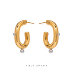 Arracadas dorado con plateado disponibles para comprar en linea vieca joyeria