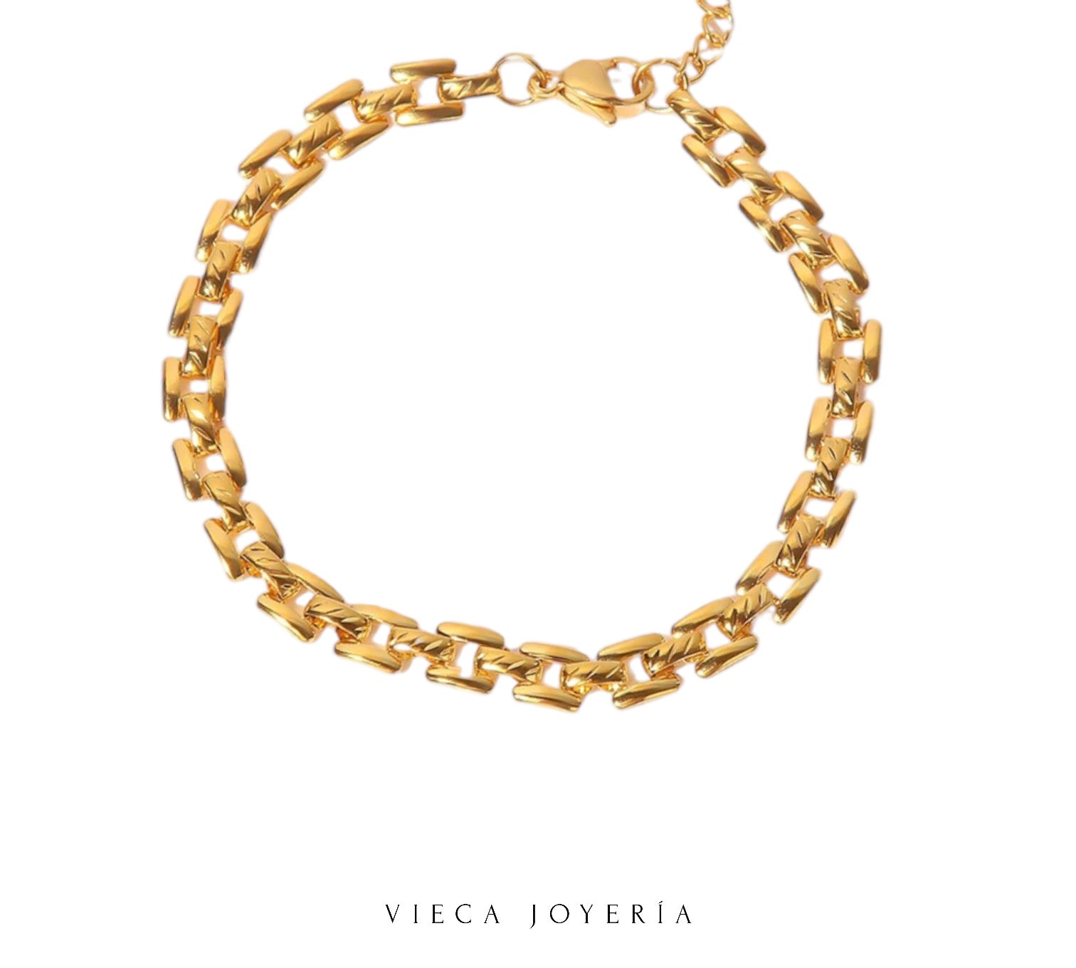 
Brazalete dorado estilo links, elegante y versátil, con eslabones entrelazados de diseño sofisticado. Perfecto para realzar cualquier outfit, desde casual hasta formal, con un toque moderno y atemporal.